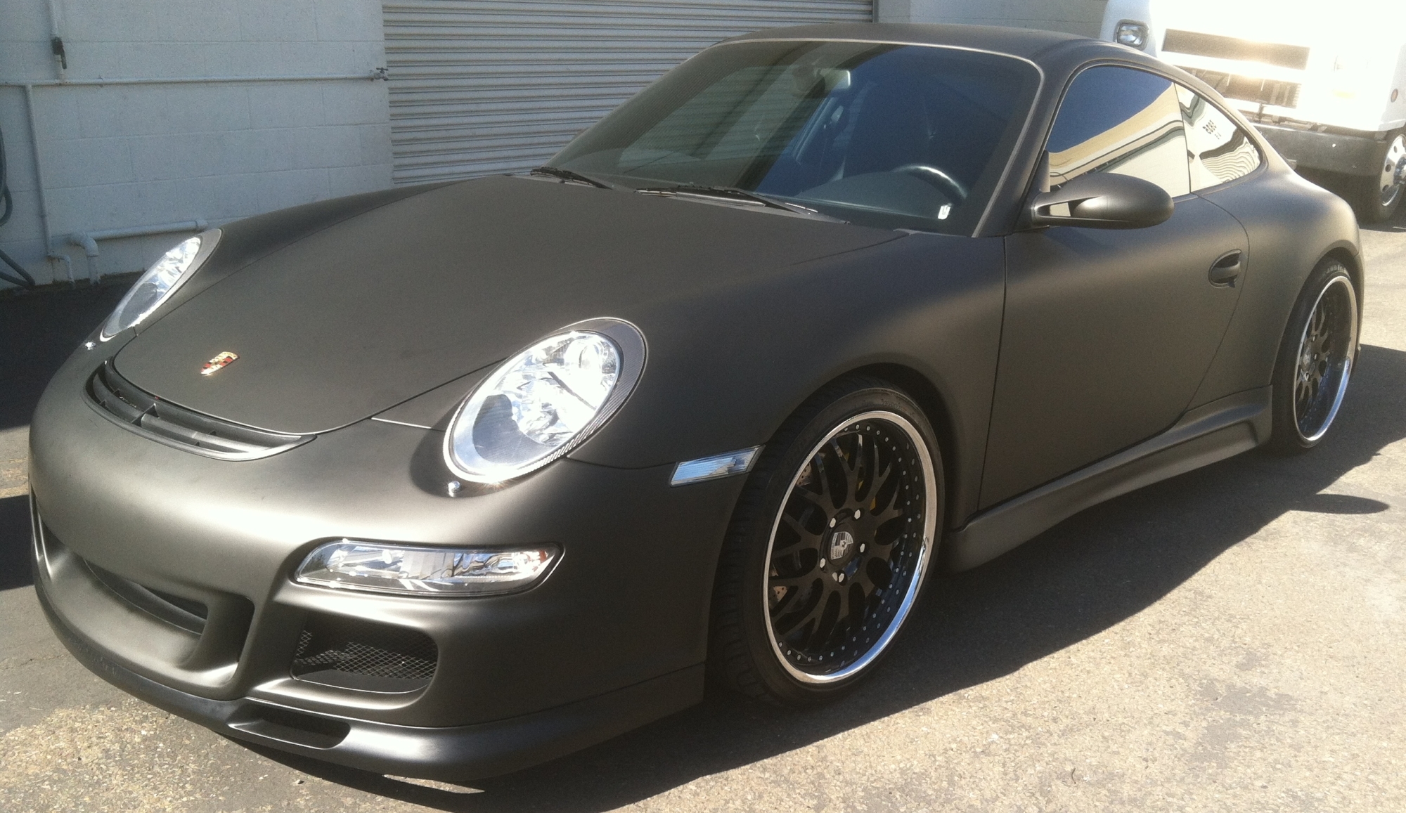 porsche matte black car wrap01 Custom Vehicle Wraps